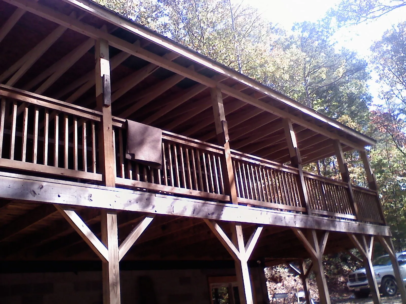 Timber framing under a new elevated porch and deck — Roof Leak Repair in Puyallup by Roofing Brothers